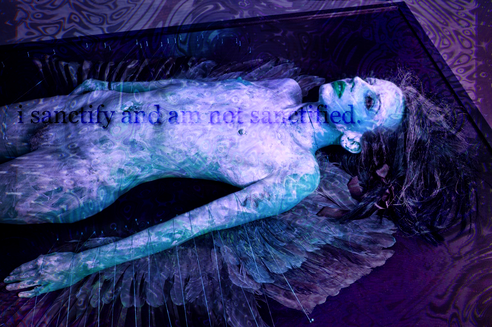 a sculpture depicting a naked woman with long hair and feathery wings laying on a table. the colours are green, blue, and purple, and complex wave-like patterns are superimposed over it. text, in purple sans serif, says 'i sanctify and am not sanctified.'